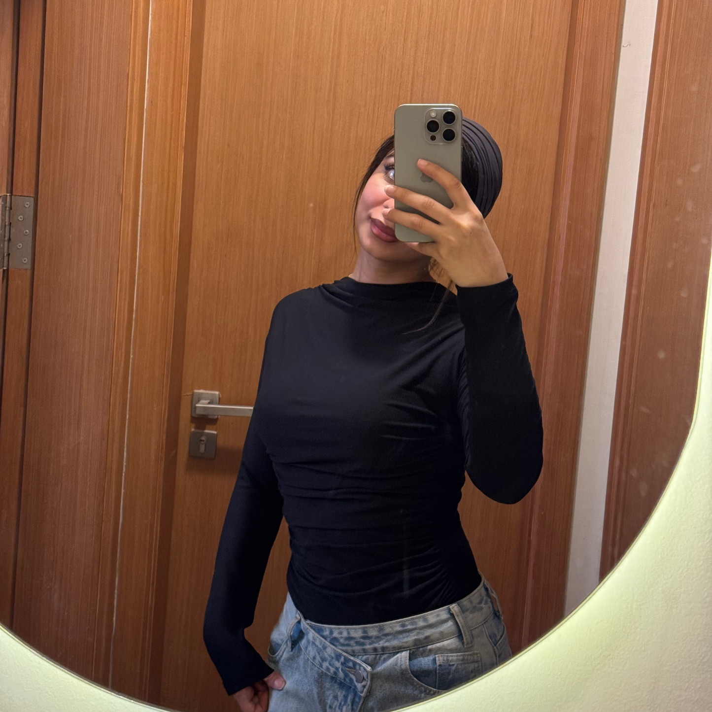 Black gathered mock-neck fitted top