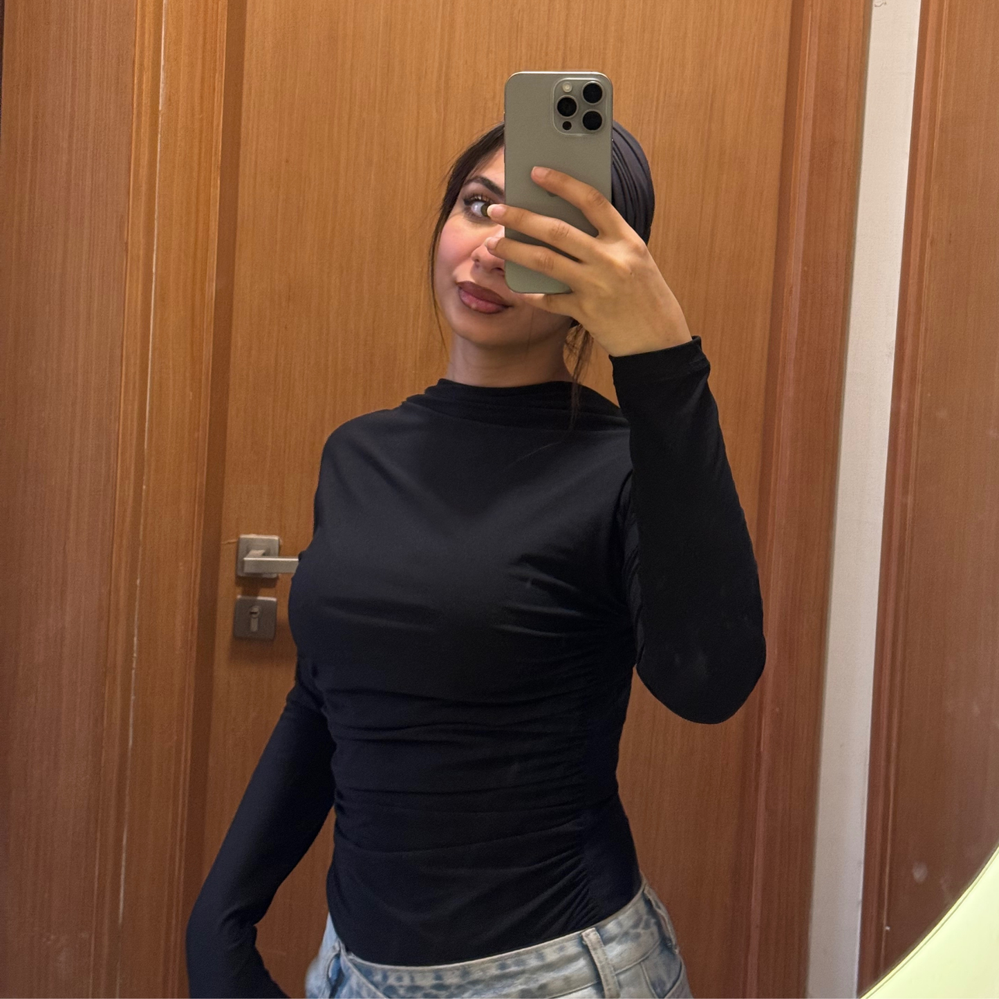 Black gathered mock-neck fitted top