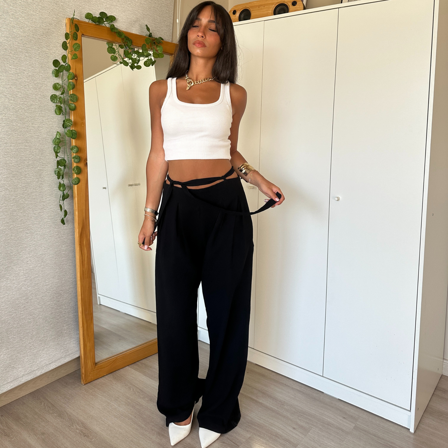 Black wide-leg pants with tie-waist detail