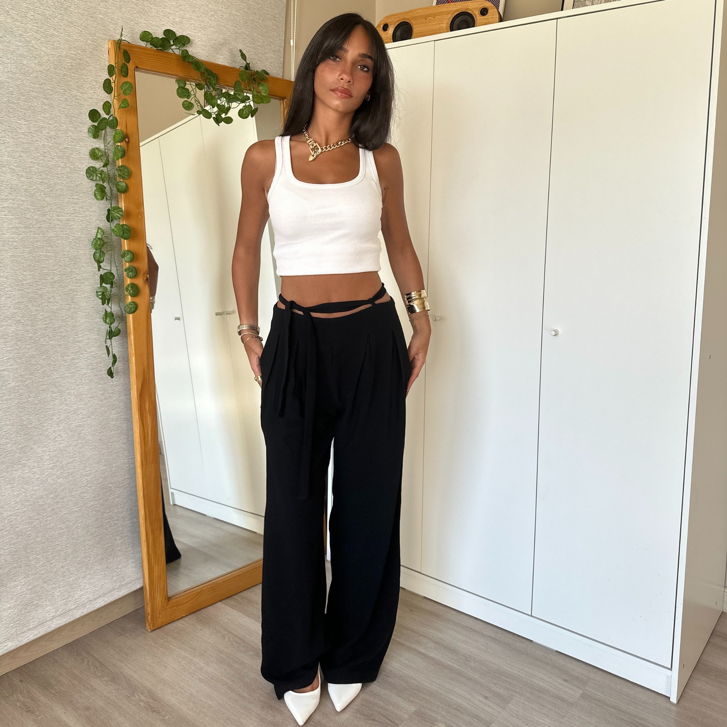 Black wide-leg pants with tie-waist detail