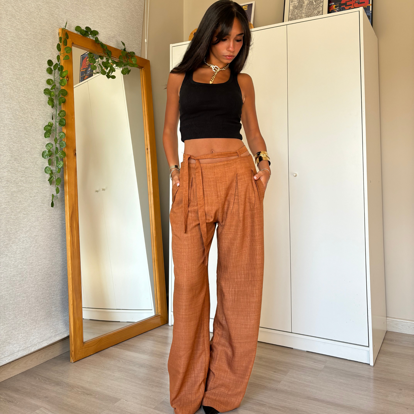 Brown wide-leg pants with tie-waist detail