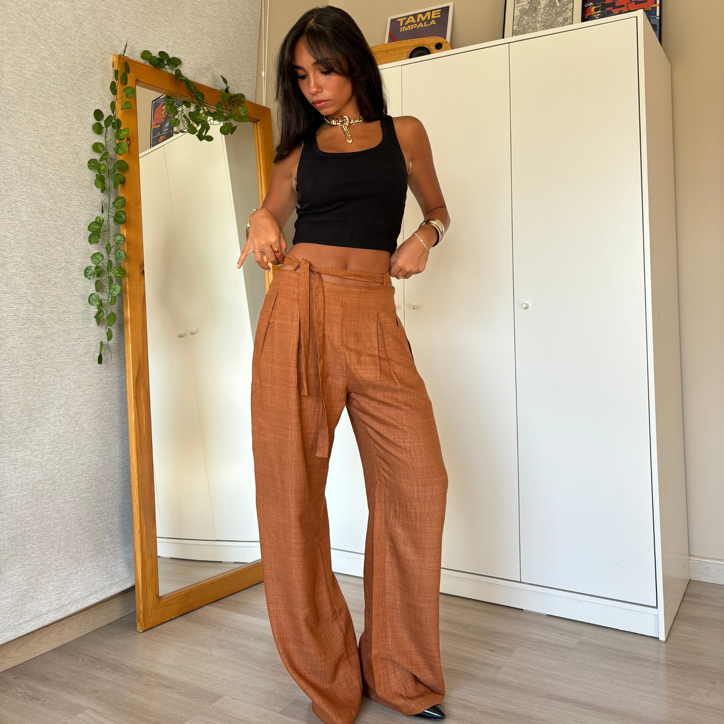 Brown wide-leg pants with tie-waist detail