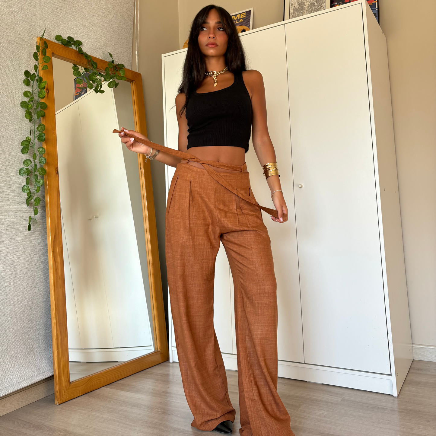 Brown wide-leg pants with tie-waist detail