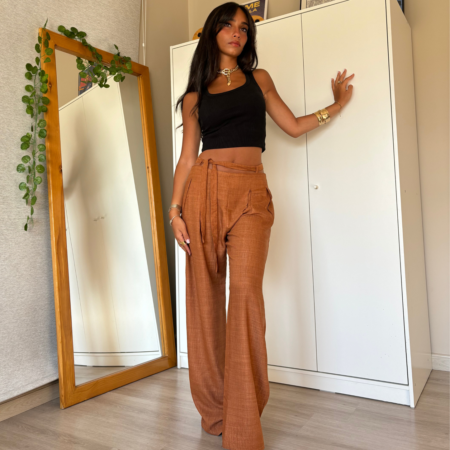 Brown wide-leg pants with tie-waist detail