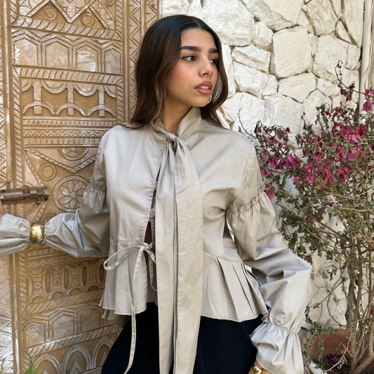 Tie neck beige pleated blouse
